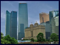 Zhujiang New Town skyline with Fortune Center and other ultramodern skyscrapers in contrasts to the neo-classicist Agricultural Bank.